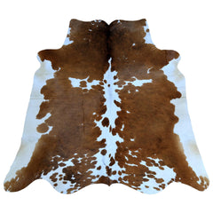 Luxurious Brown and White Cowhide Rug - Hypoallergenic, Non-Slip, Non-Shedding - Handcrafted from 100% Natural Hides - Ideal for Bedroom