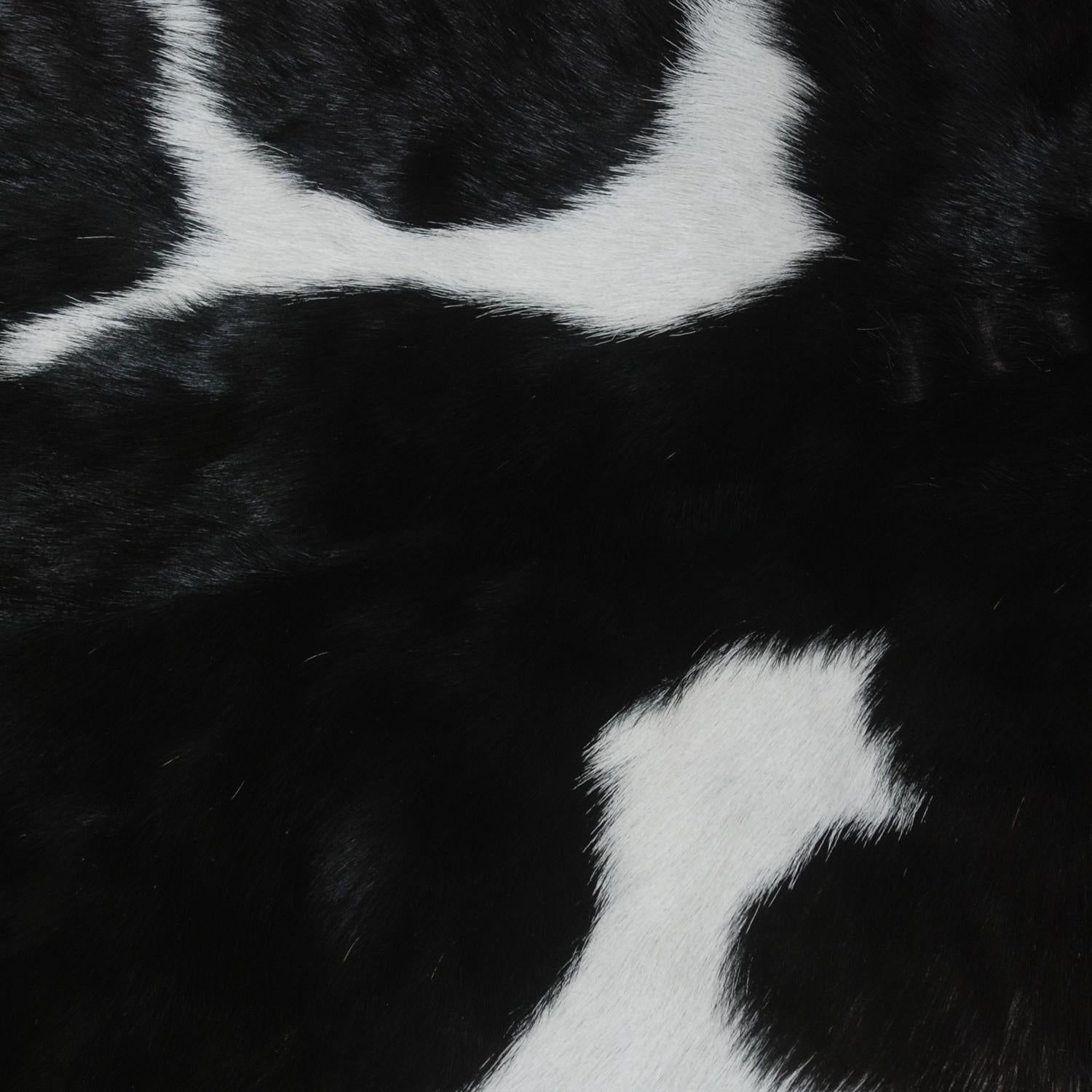 Luxury Handmade Black & White Goat Skin Rug with Unique Colour Variations - Soft, Durable, Hypoallergenic, and Eco-Friendly - Celestial Leather Limited