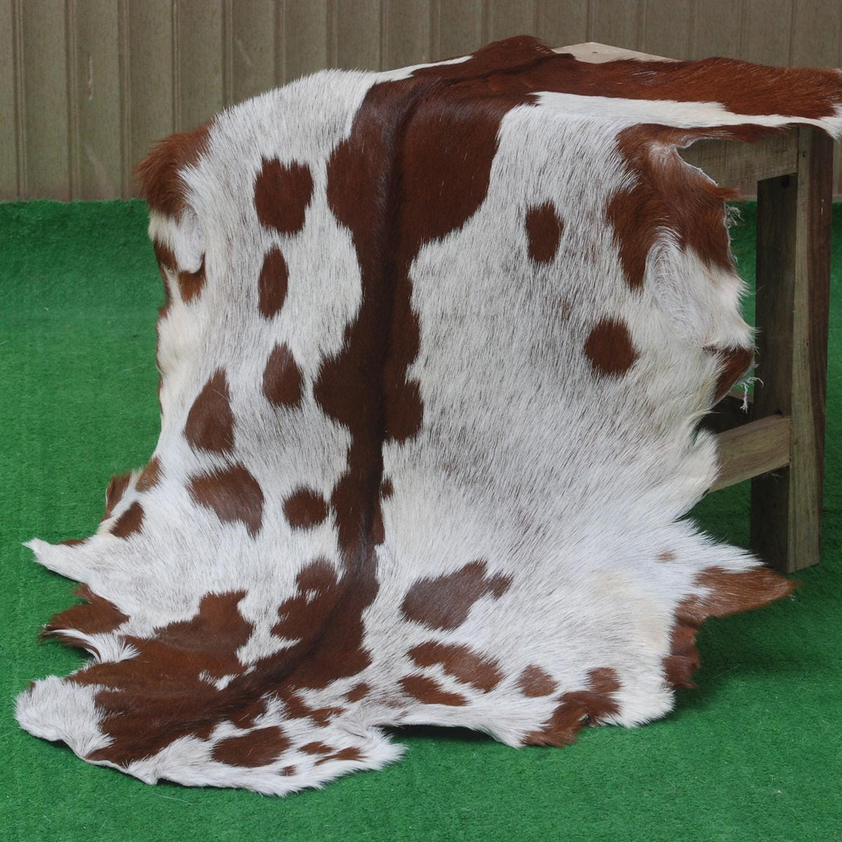 Luxurious Brown and White Goat Skin Rug - Premium Hair-On, Natural, and Sustainable - Elegant Home Decor Addition - Celestial Leather Limited