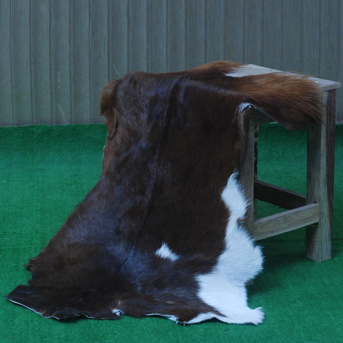 Luxury Handmade Dark Brown & White Goat Skin Rug - Soft, Hypoallergenic, & Sustainable