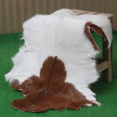 Luxurious Brown and White Premium Goat Hide Hair-on Rug - Handpicked, Handcrafted, and Eco-Friendly Sheepskin Rug for Home Décor